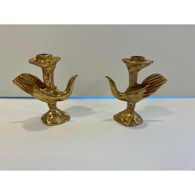 This pair of fire gilt bronze candlesticks was designed by Pierre Casenove & dated 1994 Born in 1943 Pierre is one of...
