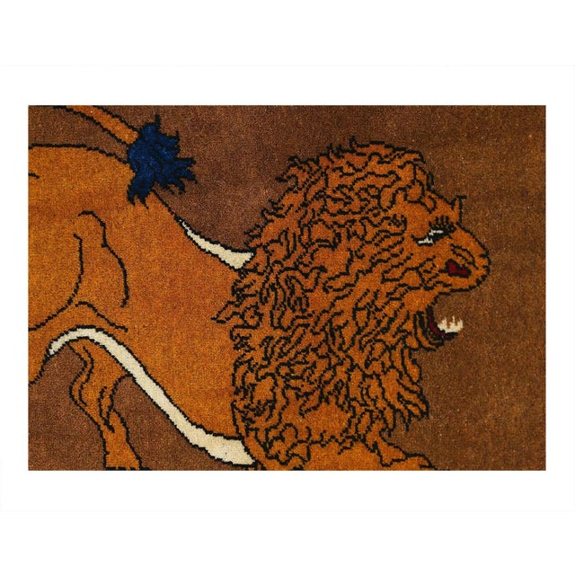 A modern Persian Shiraz small throw rug handmade during the 21st century with a pictorial design of a male lion in Brown...