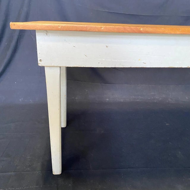 This classic primitive style dining table in the farmhouse style is from an early Grange in Maine. Used since the 1800s to...