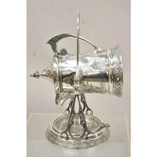 Antique Wilcox Silver Plate Co Victorian Porcelain Lined Tilting Coffee Tea Pot. Item features ornate floral etched...
