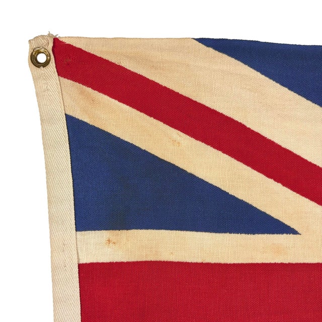This vintage Canadian Red Ensign flag is made from a cotton cloth with printed Union Jack and crest visible on both sides....