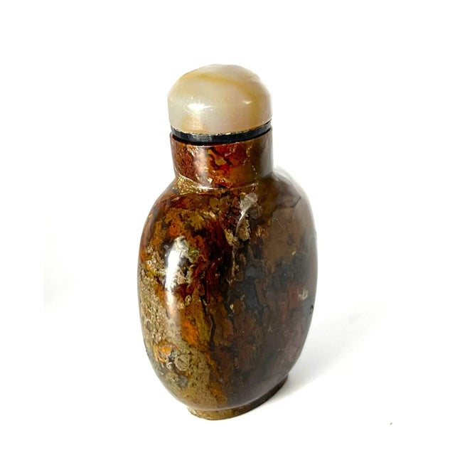 This is one of the most understated snuff bottle in my collection. Its appearance is dark, but when seen in bright lights,...