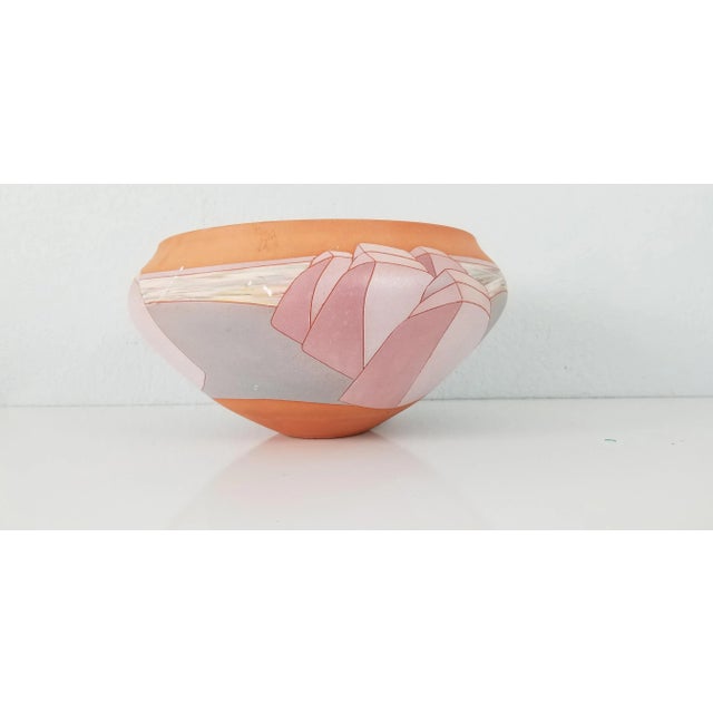 Offering a stunning Vintage Modernist art studio Pottery decorative vase. Artist signed on the bottom. This heavy and...