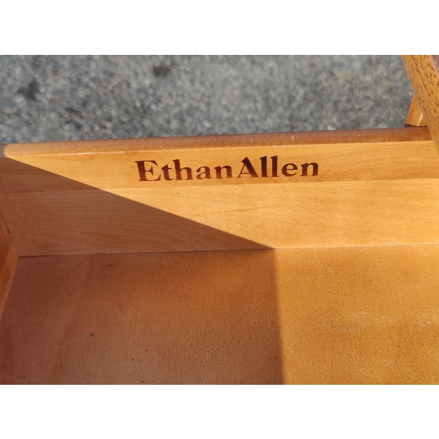 Charming vintage Ethan Allen maple bedside/end table from the classic Baumritter Heirloom furniture line. Offers 3 tiers...