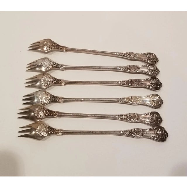 Six rare antique sterling silver Tiffany and Co English King seafood forks.