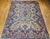 "Step into timeless elegance with this vintage Persian Kerman Lavar rug, a room-size masterpiece from the early 1900s....
