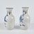 Pair of Chinese, hand-painted porcelain vases featuring figures in nature, with a crackle glaze and branch formed handles...