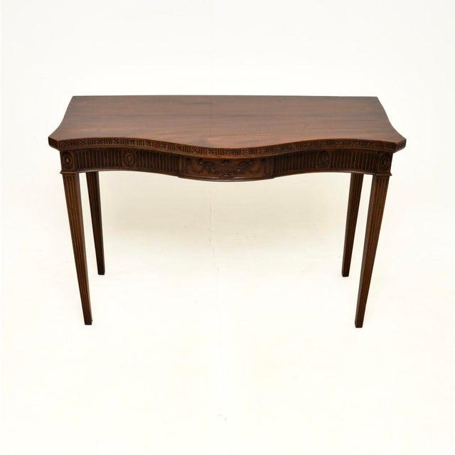 A smart and extremely well made antique Edwardian console table. This was made in England, it dates from around the...