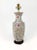 Beautiful vase lamp featuring traditional Chinese style illustration motif of peonies and other blossoms. Blooms painted...