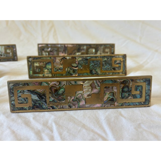 Stunning large brutalist brass and abalone cabinet handles similar to Los Castillo or Peñoles. The only mark on the back...