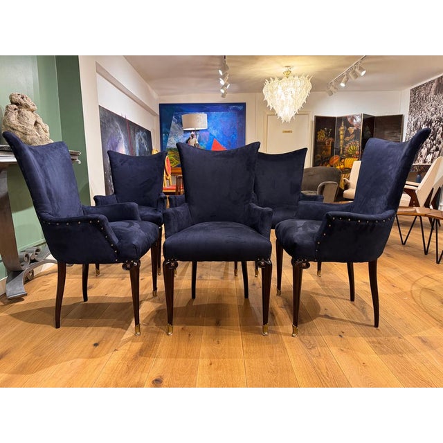 A rare set of six high back dining room chairs with arms . All newly restored and upholstered in midnight blue brushed...
