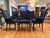 A rare set of six high back dining room chairs with arms . All newly restored and upholstered in midnight blue brushed...
