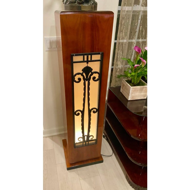 Art Deco Lighted Mahogany and French Rod Iron Pedestal Column. Front Panel and Top are Frosted Glass.