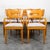 Handsome set of 8 "dog bone" dining chairs in solid birch by Heywood Wakefield. The fabric and seats have been...