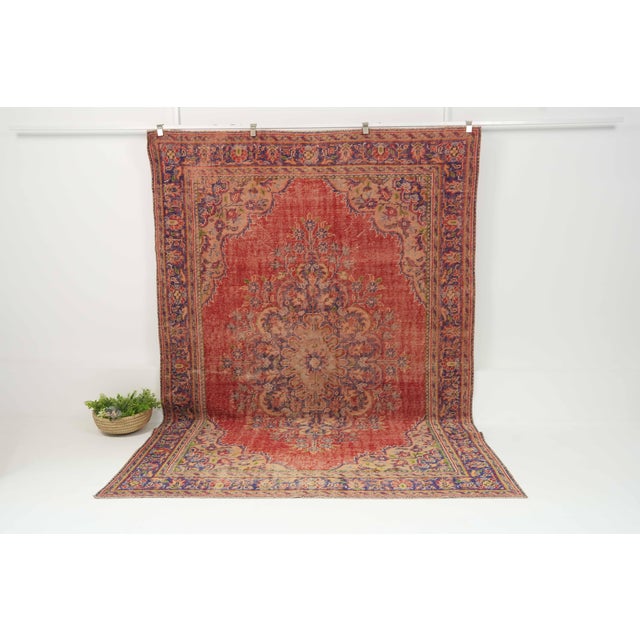 Vintage Hand-Knotted runner rug is a semi-antique vintage area rug. The '70s Eastern region of Anatolia's unique rug is...