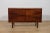 A sideboard designed by the Danish designer Ib Kofod-Larsen, produced in the 1960s in the Danish factory Faarup...