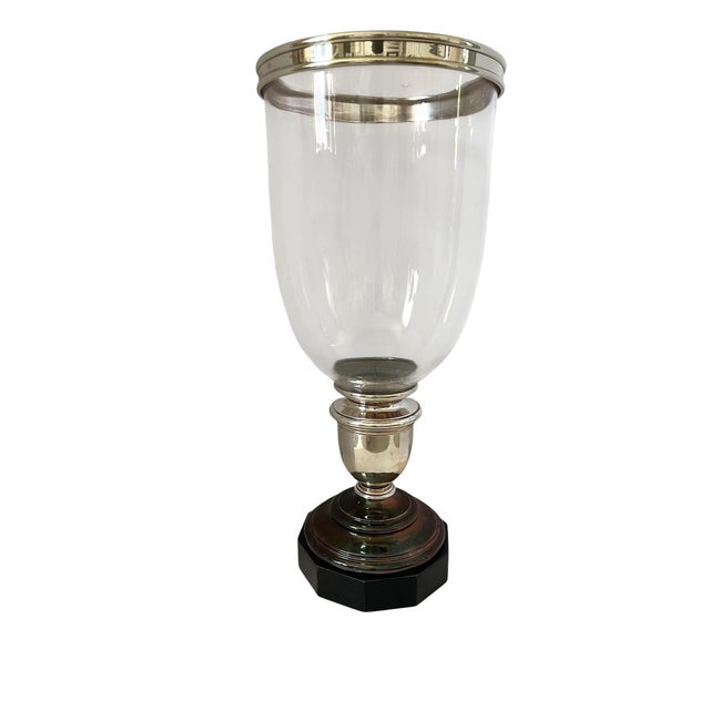 The Ralph Lauren Hurricane Original Candle Holder is a stylish and modern addition to any home decor. This large round...