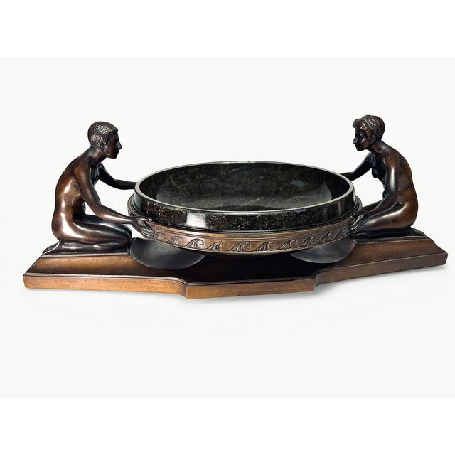 Stunning art deco centrepiece, bronze female and male figures holding a black marble bowl.