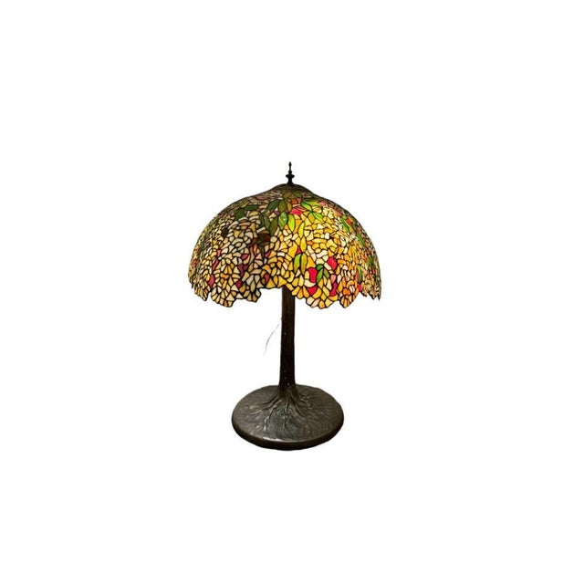 Illuminate your space with the timeless elegance of our Stained Glass Table Lamp. This exquisite lamp is a true work of...