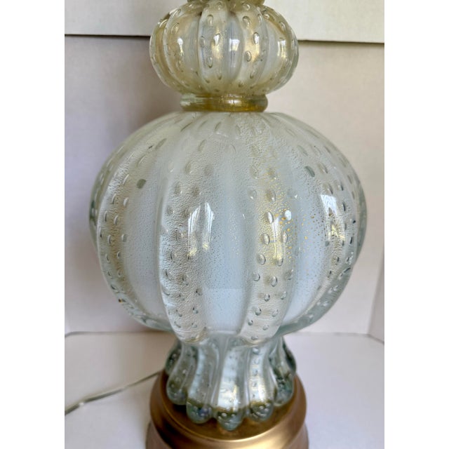 Here is an incredible, Murano Art Glass table lamp from the 1940-50's. The lamp is a statement piece! It features a...