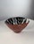 Striking decorative art glass bowl by Kosta Boda, featuring a bold, sculptural form and an expressive combination of red,...