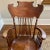 This antique rocker has been in my family forever. It’s a gorgeous piece of furniture with inlaid wood and mother-of-...