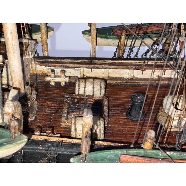 Primitive model of the American whaleship Wanderer of New Bedford. Details include a winch, whaleboats, hatches,...