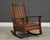 This handsome L. & J.G. Stickley Mission oak rocking chair showcases the clean lines and exceptional craftsmanship that...