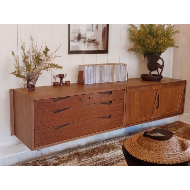 Mid-Century Scandinavian Rival Wall-Mounted Teak Storage Unit, 1960s, in Good conditions. Designed 1960 to 1969 This piece...