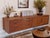 Mid-Century Scandinavian Rival Wall-Mounted Teak Storage Unit, 1960s, in Good conditions. Designed 1960 to 1969 This piece...