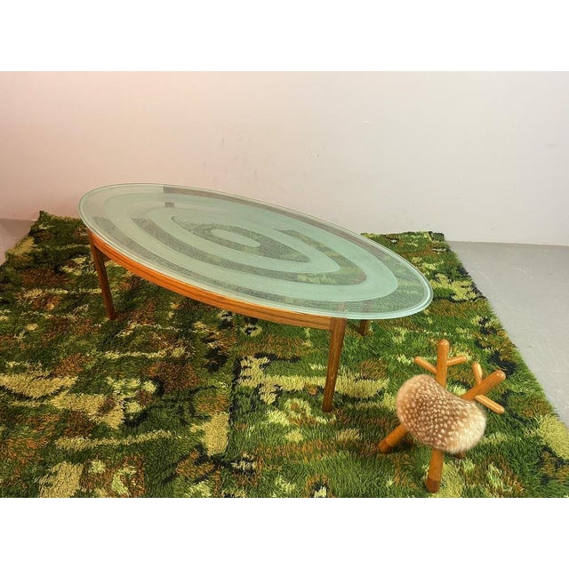 Magnificent mid-century oval coffee table designed by renowned danish designer ib kofod-larsen and manufactured by...