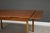 A mid century modern teak draw leaf dining table with two self storing leaves. Made in Denmark. Professionally refinished....