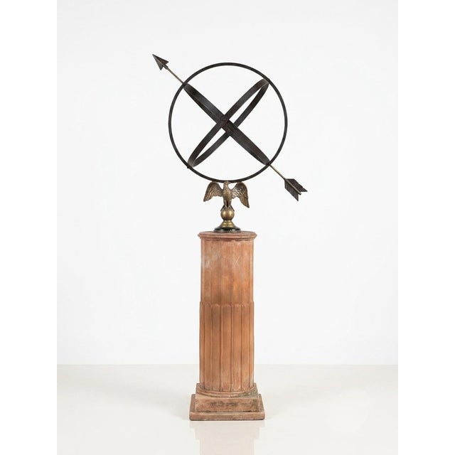 A commanding statement piece for a formal garden, courtyard, or grand entryway, this Neoclassical armillary sphere sundial...