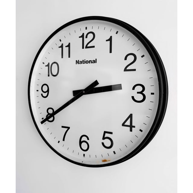 Large-Scale National Factory Clock, Japan, 1960s A striking large-scale factory wall clock produced by National in Japan...