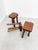 Raw and timeless, these brutalist stools are crafted from solid elm wood. with their thick square seats featuring visible...