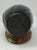 Santa Clara Pueblo pottery is renowned for its hand-coiled, highly polished blackware and redware, often featuring deep,...