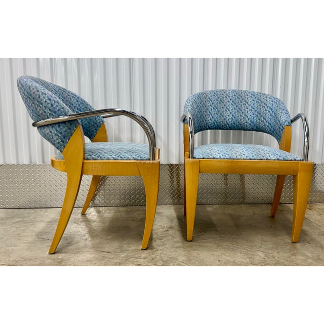 Elevate your space with this sophisticated set of four “Willow” chairs designed by Mitchell Pickard for Brueton. A...