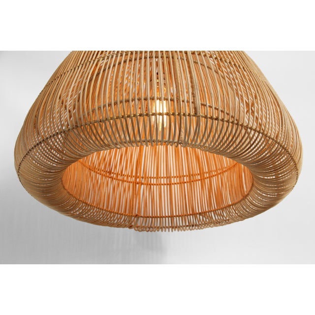 Hand woven natural raw rattan mushroom shaped pendant light. Open, airy, organic yet sculptural presence. Each may have...
