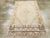 A vintage Turkish Oushak accent rug. This basically open field beige and rust Anatolian scatter has an Art Deco look in...