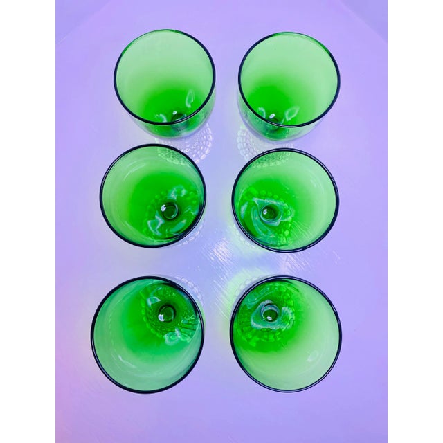 Beautiful forest green water/goblet wine glass with clear glass bubble foot by Anchor Hocking, 1950s. The green color...