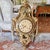 A substantial and decorative carved gilt wood Swedish cartouche form clock in the traditional bold Gustavian manner...