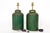 A pair of late 1800s tole tea tin canisters made into table lamps. They are green with gold trim and finely hand-painted...