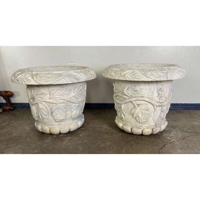 Pair of 19th Century Hand-Carved Carrara Marble Planters A striking pair of 19th century Italian urn-form planters,...