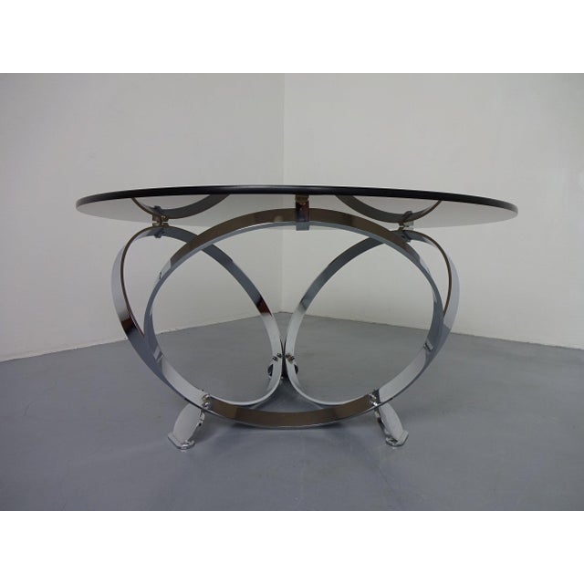 Space Age table by Knut Hesterberg with a heavy, tinted glass top and metal frame from the 1960s. I have official proof of...