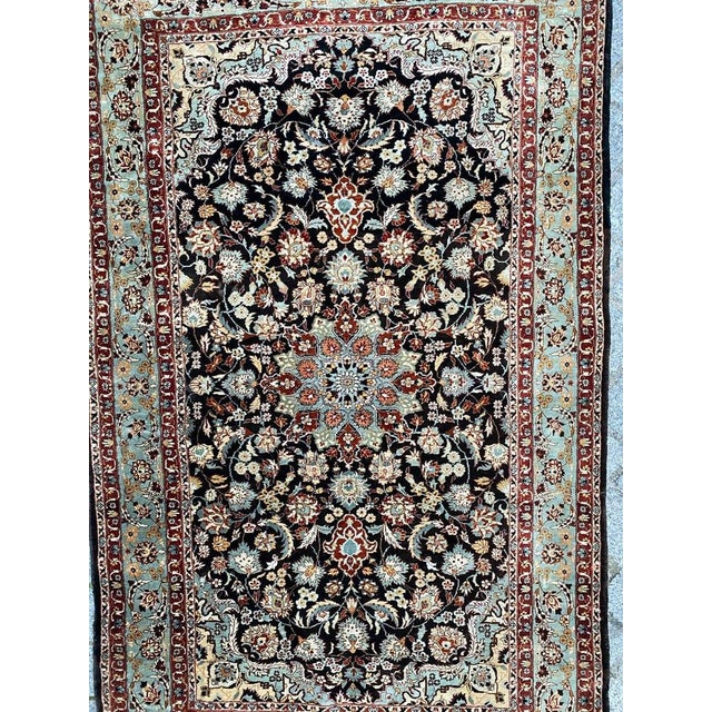 Very beautiful silk rug with a Persian design and nice colors, entirely and finely hand knotted with silk velvet on silk...