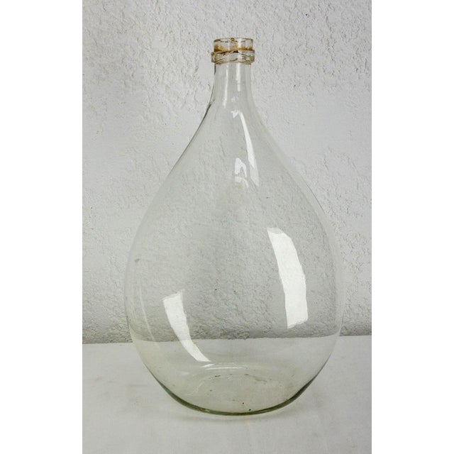 Dame Jeanne or carboy antique glass bottle demijohn Irregularities in the glass that give it all its charm: the the bottle...