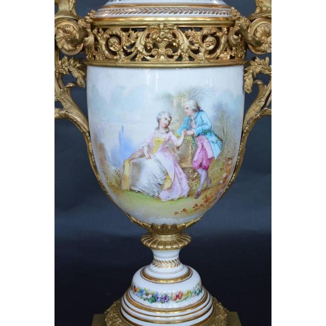 Bronze figural mounted serves. Hand-painted.