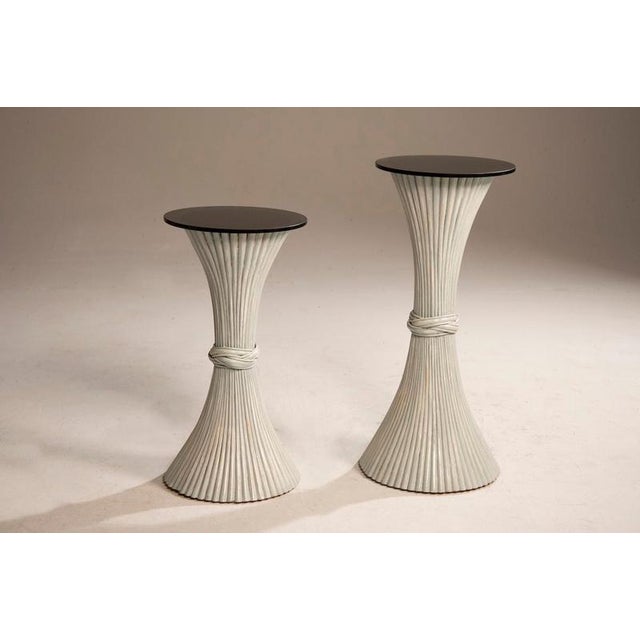 Pair of white-painted bamboo plant stands from the 1970s. Plant stand 1 measurements: H 77 cm × diam. 40 cm Glass top...