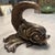 By the Legendary ITALIAN ARTIST-designer. Modeled as a mythical dolphin, hand-crafted from Sarda rams horn and silvered...