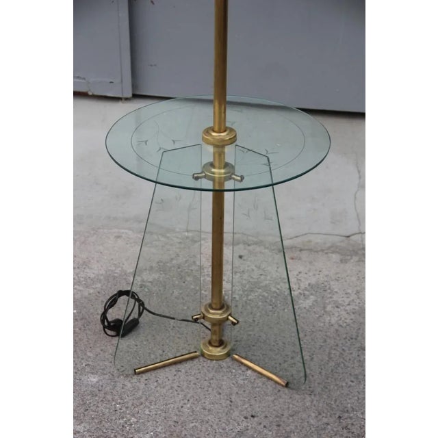 - Floor lamp with small tabletop - Brass details - Engraved glass European Plug (up to 250V).The wiring of this item may...